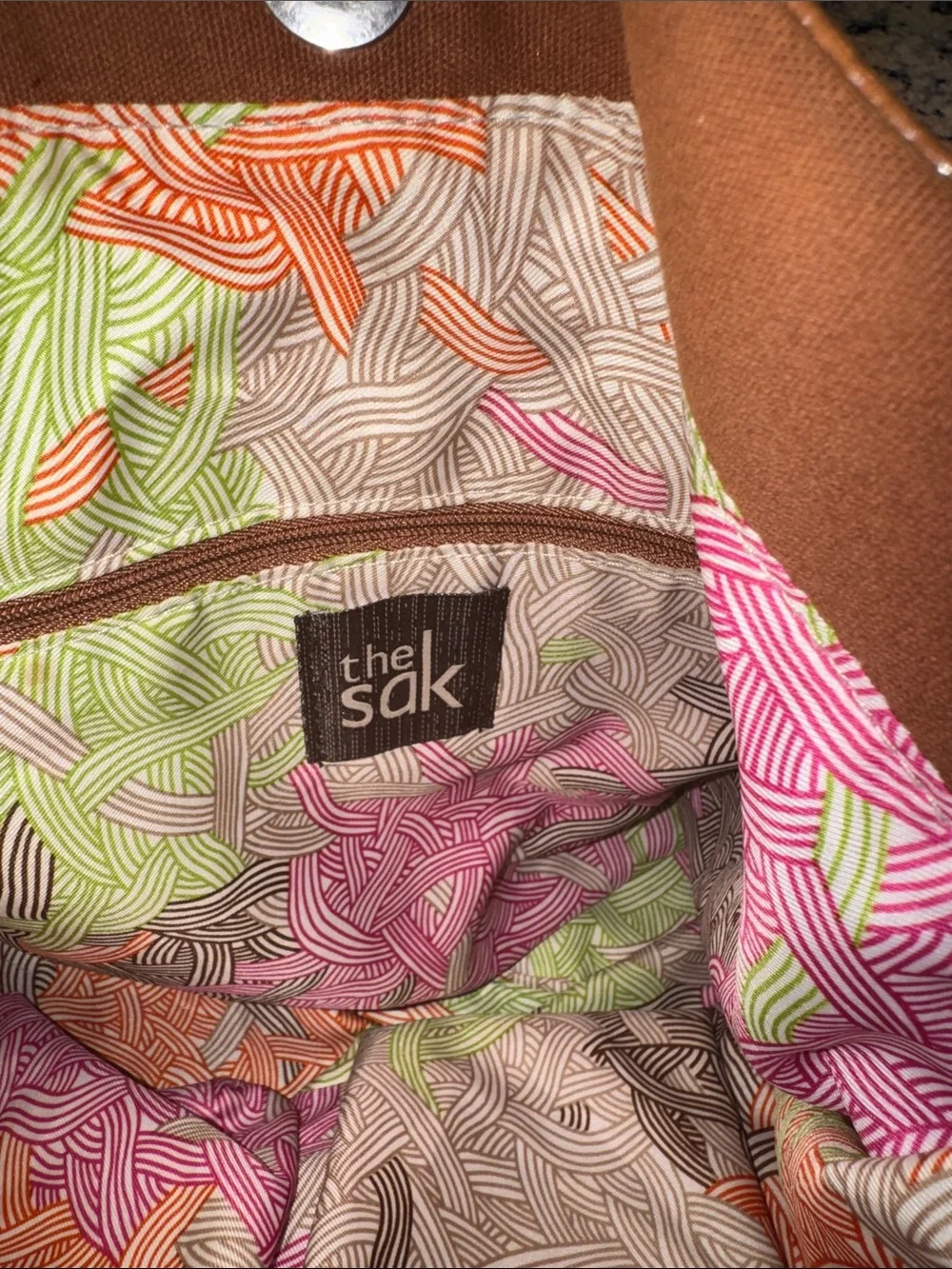 The Sak compact cognac
